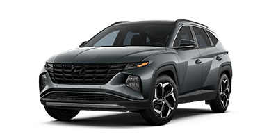 Grey SUV with sleek design and modern features, emphasizing front grille and headlights.