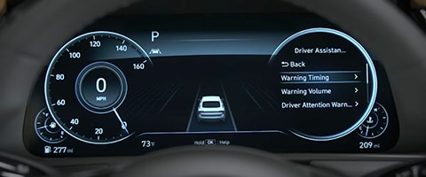 Car dashboard displaying digital speedometer, driver assistant options, and vehicle status indicators.