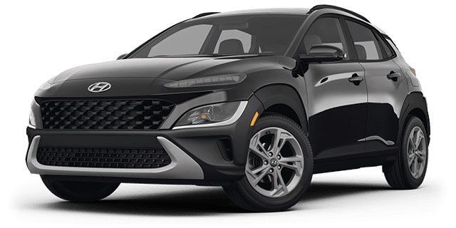 Couple relaxing with a hot drink at home, sitting on the floor next to a couch, conveying comfort and warmth.