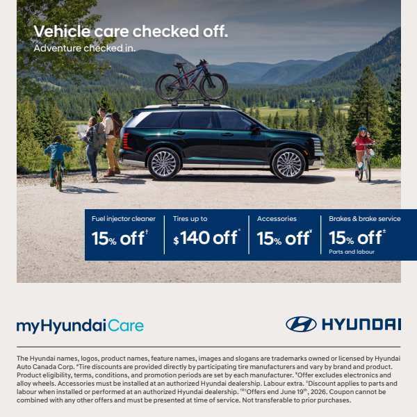 Hyundai vehicle with bikes on roof in scenic mountain landscape, promoting care discounts.