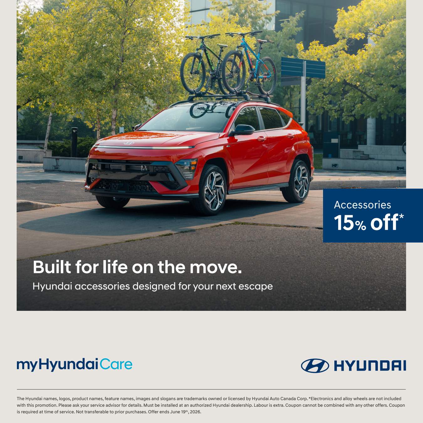 Red Hyundai SUV with bikes on the roof, promoting 15% off accessories. Text reads, "Built for life on the move."